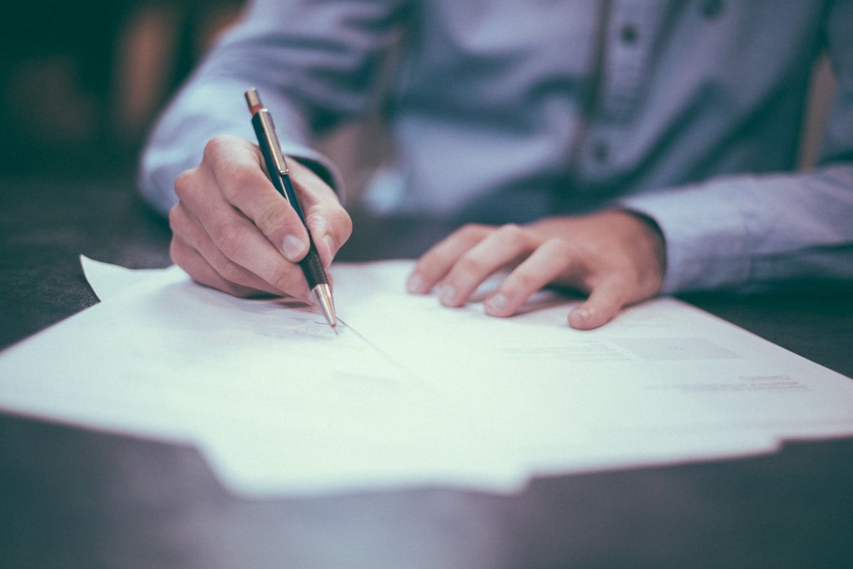 Reviewing paperwork at a desk